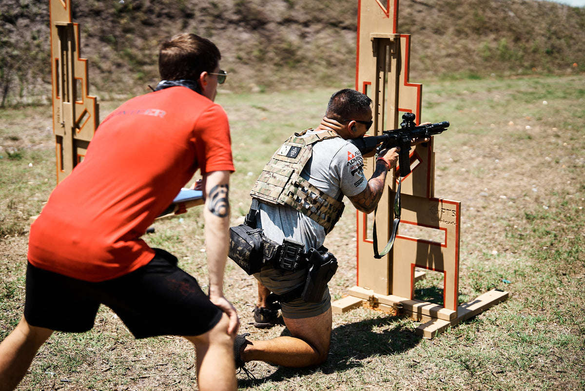 Shooter and coach training with a PTS Barricade at an outdoor range